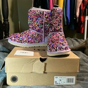 Brand new purple sequin Uggs in the box. Kids size 5 which is a women’s 6 1/2.